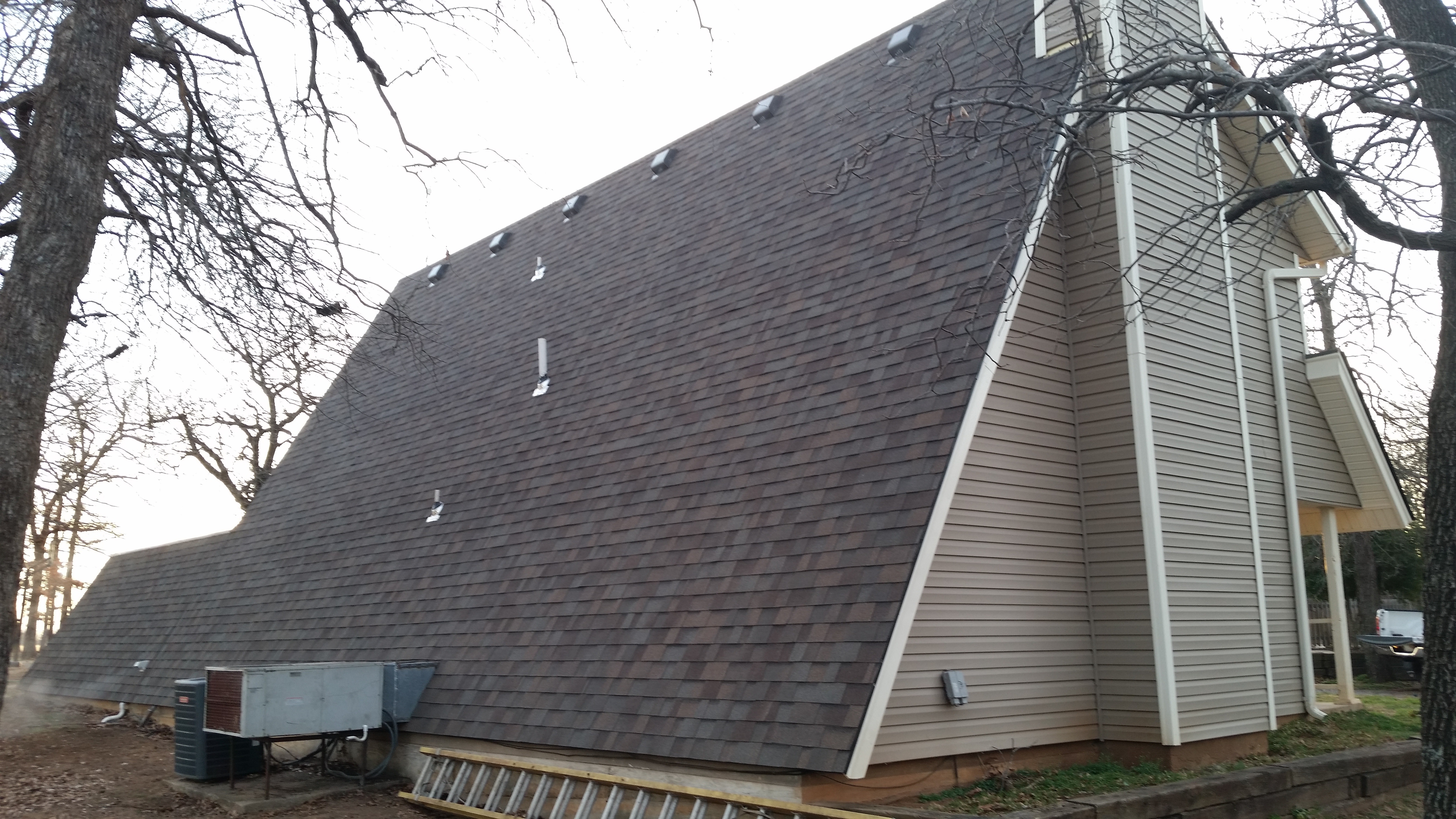 shingle roof install on home